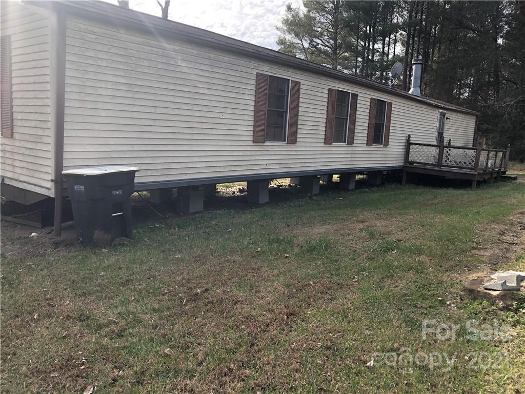 992 Flat Swamp Road Denton, NC 27239 - Photo 2 of 6 a view of a house with a yard