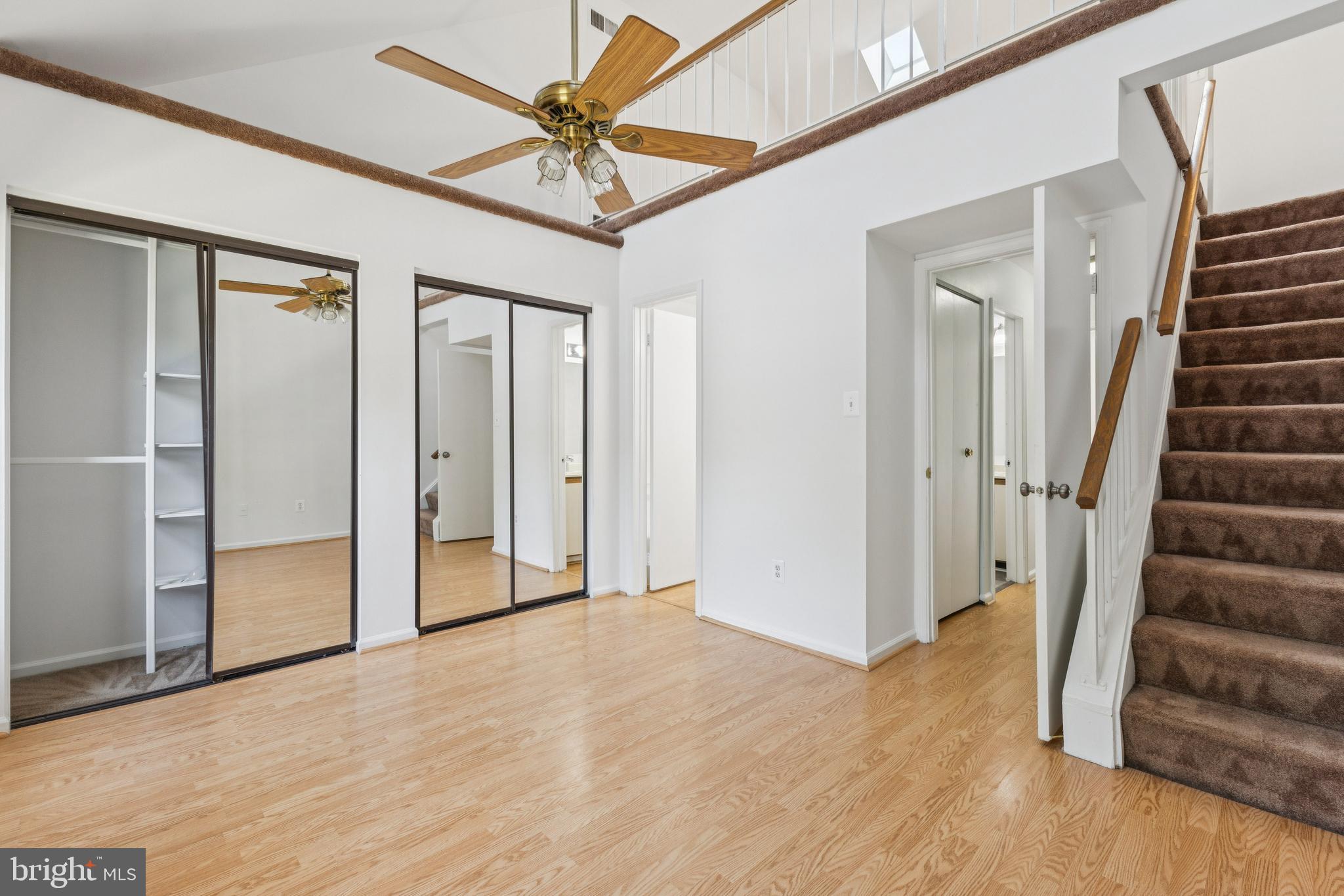 8485 Laurel Oak Drive Springfield, VA 22153 - Photo 22 of 40 a view of a hallway with wooden floor and entryway
