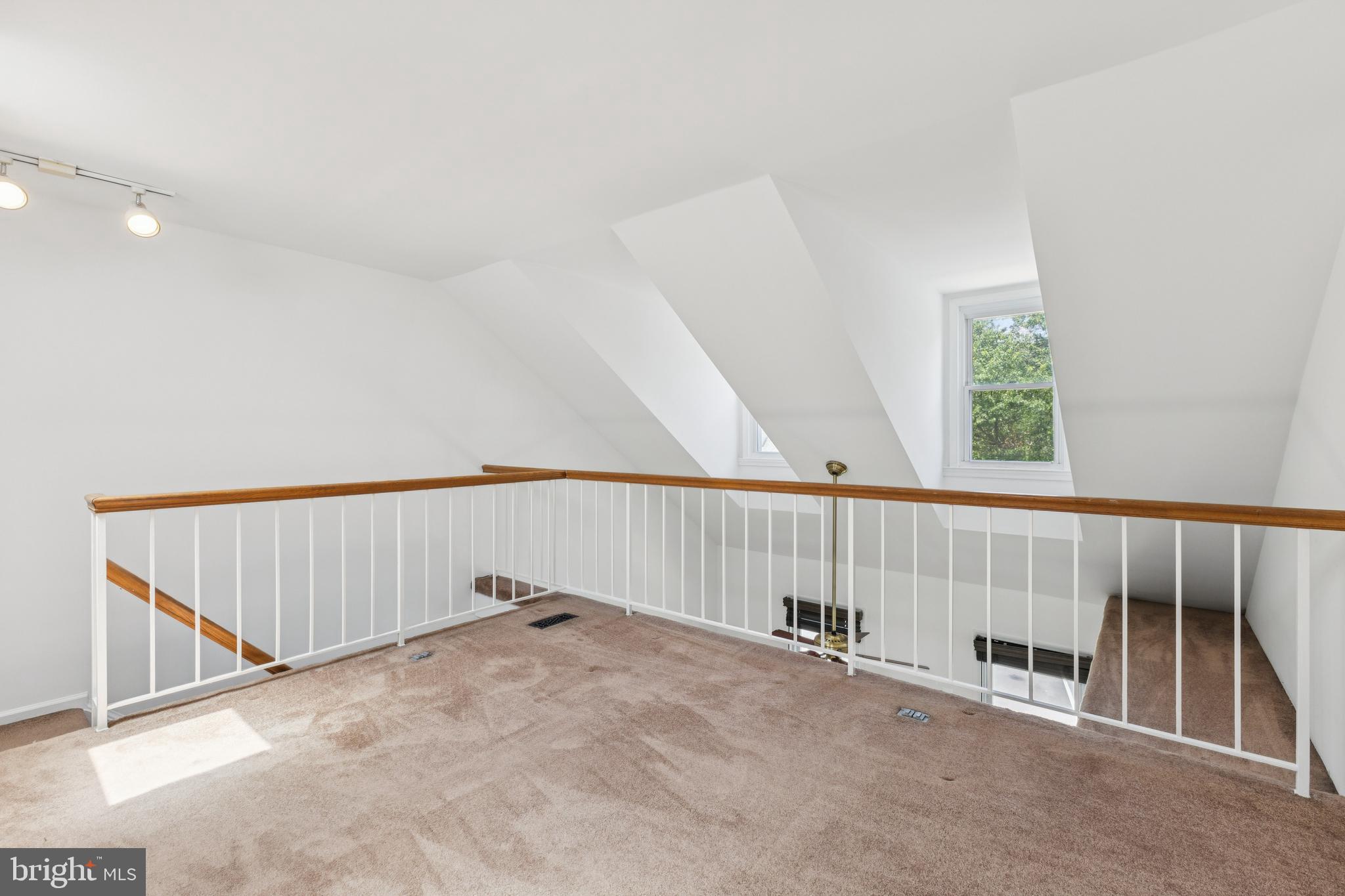 8485 Laurel Oak Drive Springfield, VA 22153 - Photo 27 of 40 a view of a hallway with staircase