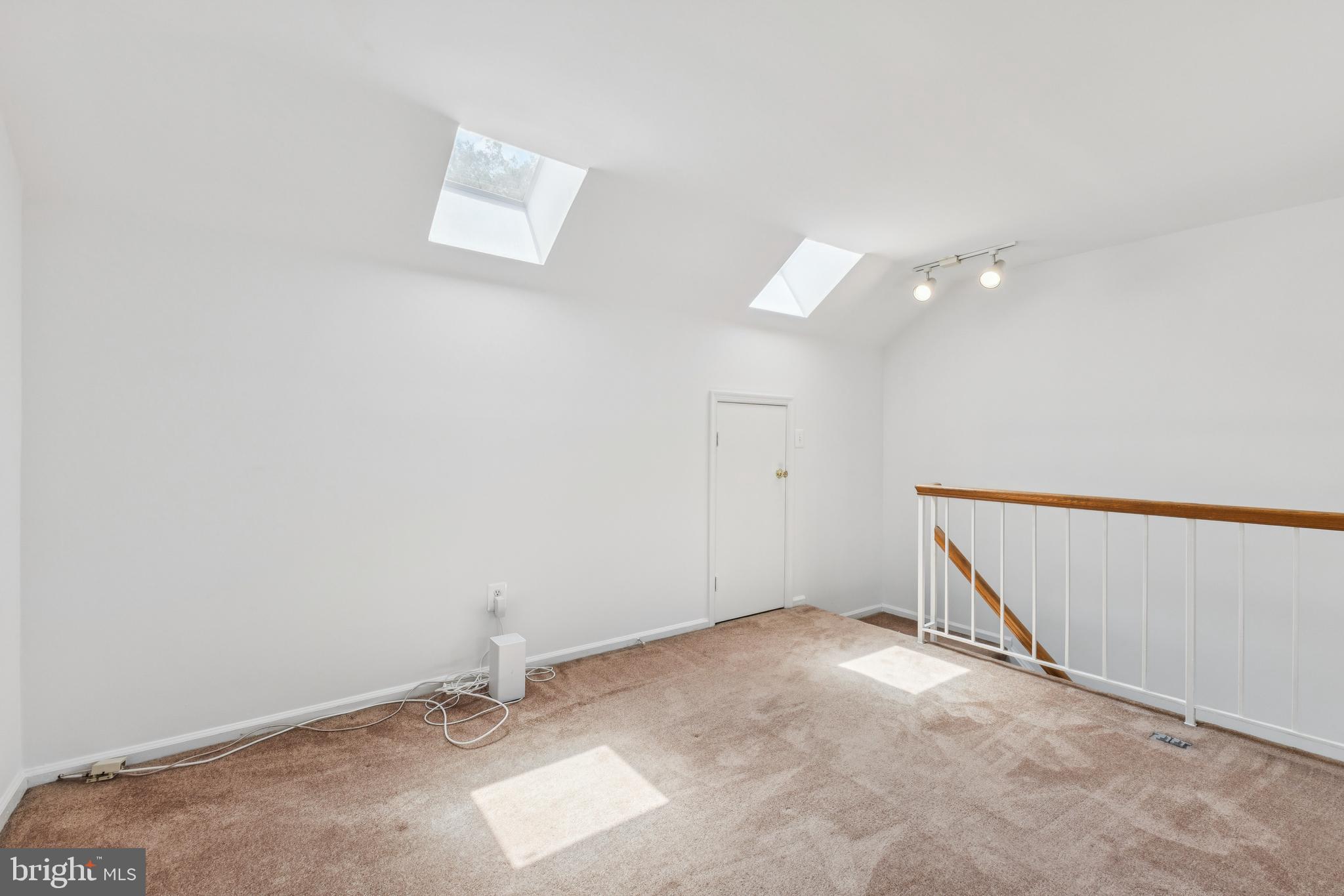 8485 Laurel Oak Drive Springfield, VA 22153 - Photo 28 of 40 an empty room with a ceiling fan and window