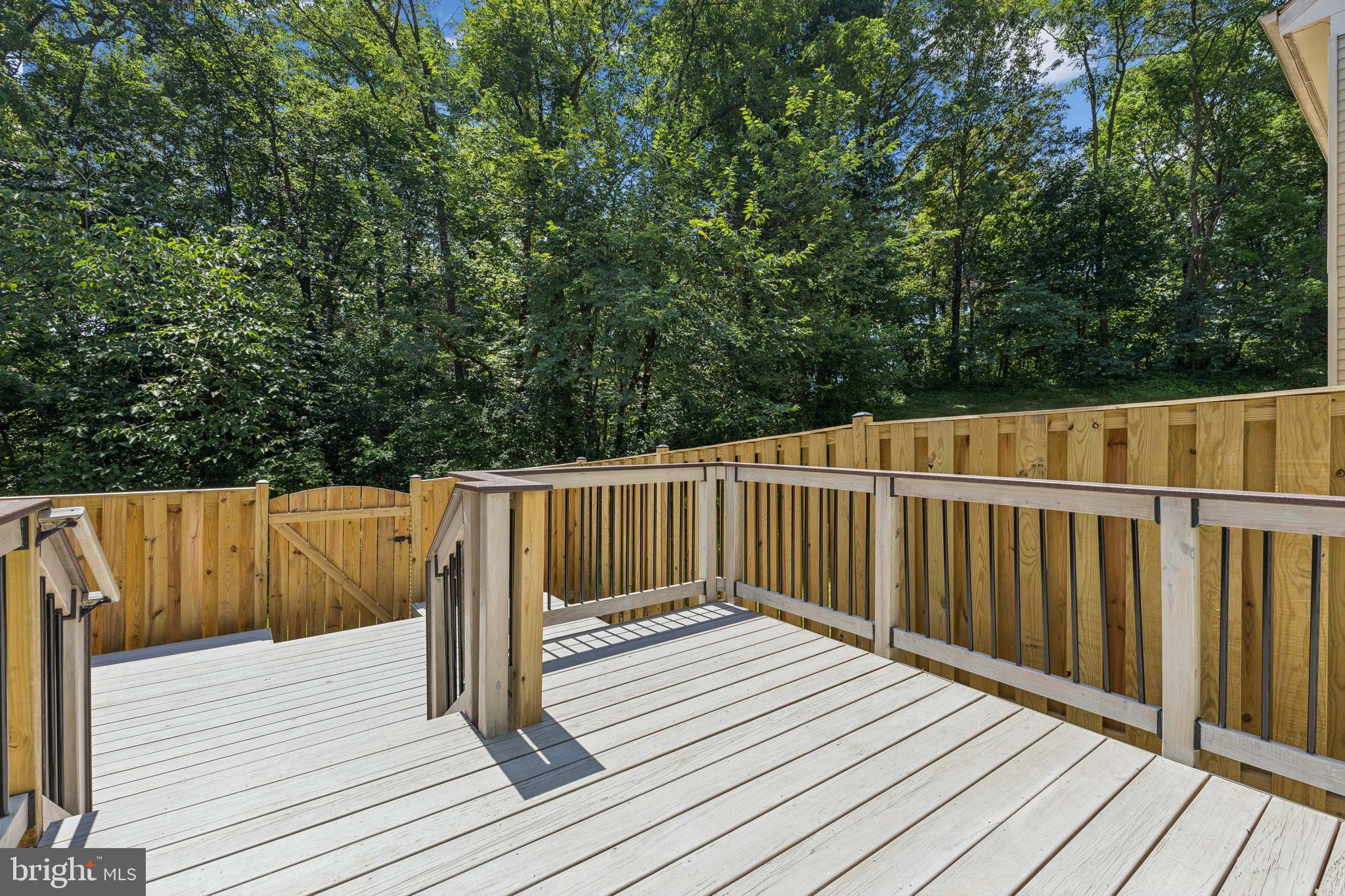 8485 Laurel Oak Drive Springfield, VA 22153 - Photo 35 of 40 a view of deck with wooden floor and fence