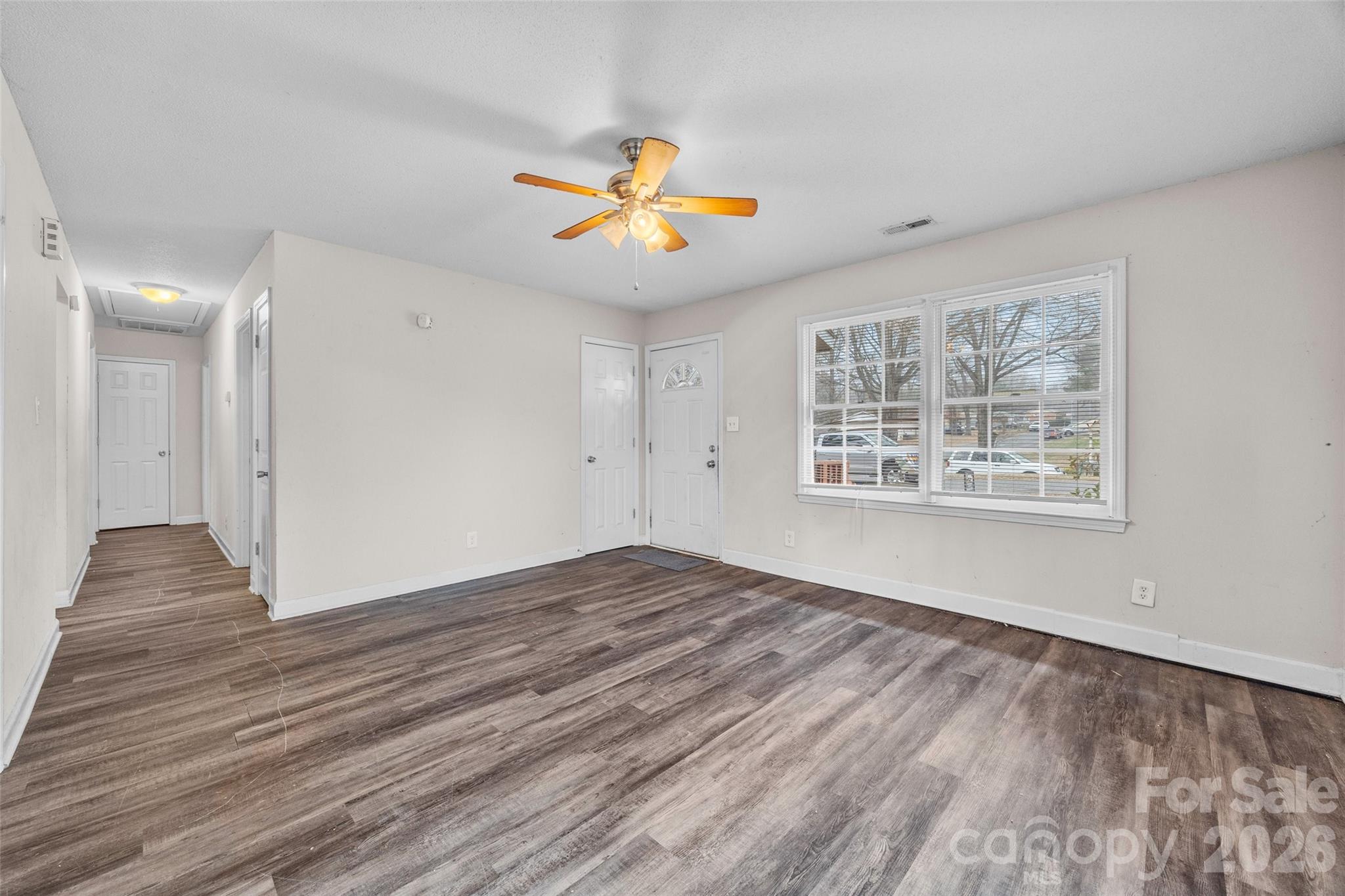 105 McGee Street Fort Mill, SC 29715 - Photo 4 of 23 wooden floor in an empty room with a window