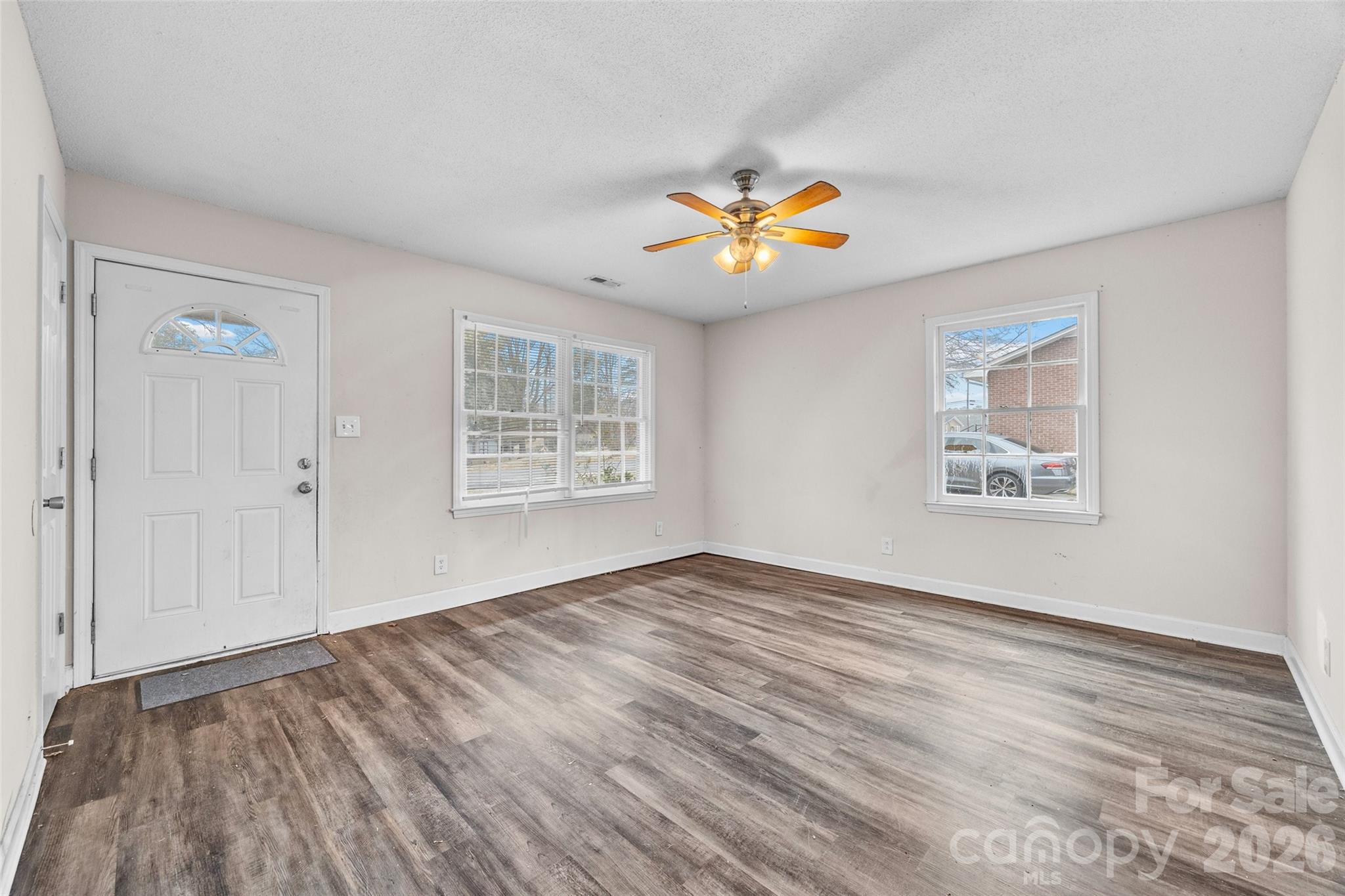 105 McGee Street Fort Mill, SC 29715 - Photo 5 of 23 wooden floor in an empty room with a window