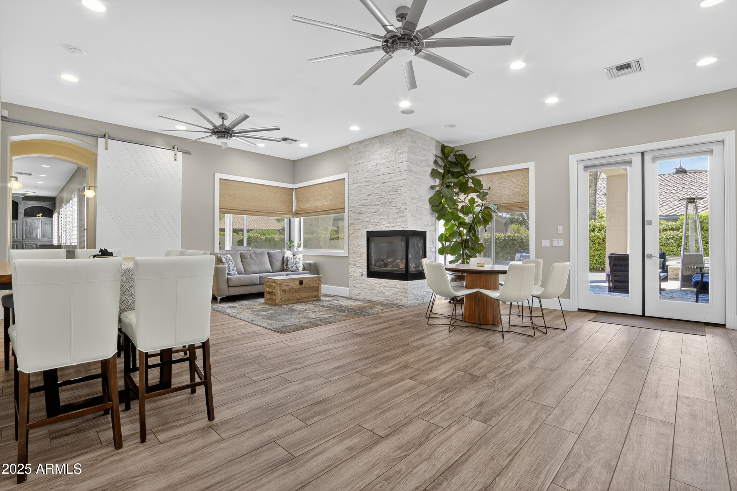 1333 North Cliffside Drive Gilbert, AZ 85234 - Photo 20 of 98 a view of a livingroom with furniture window and wooden floor