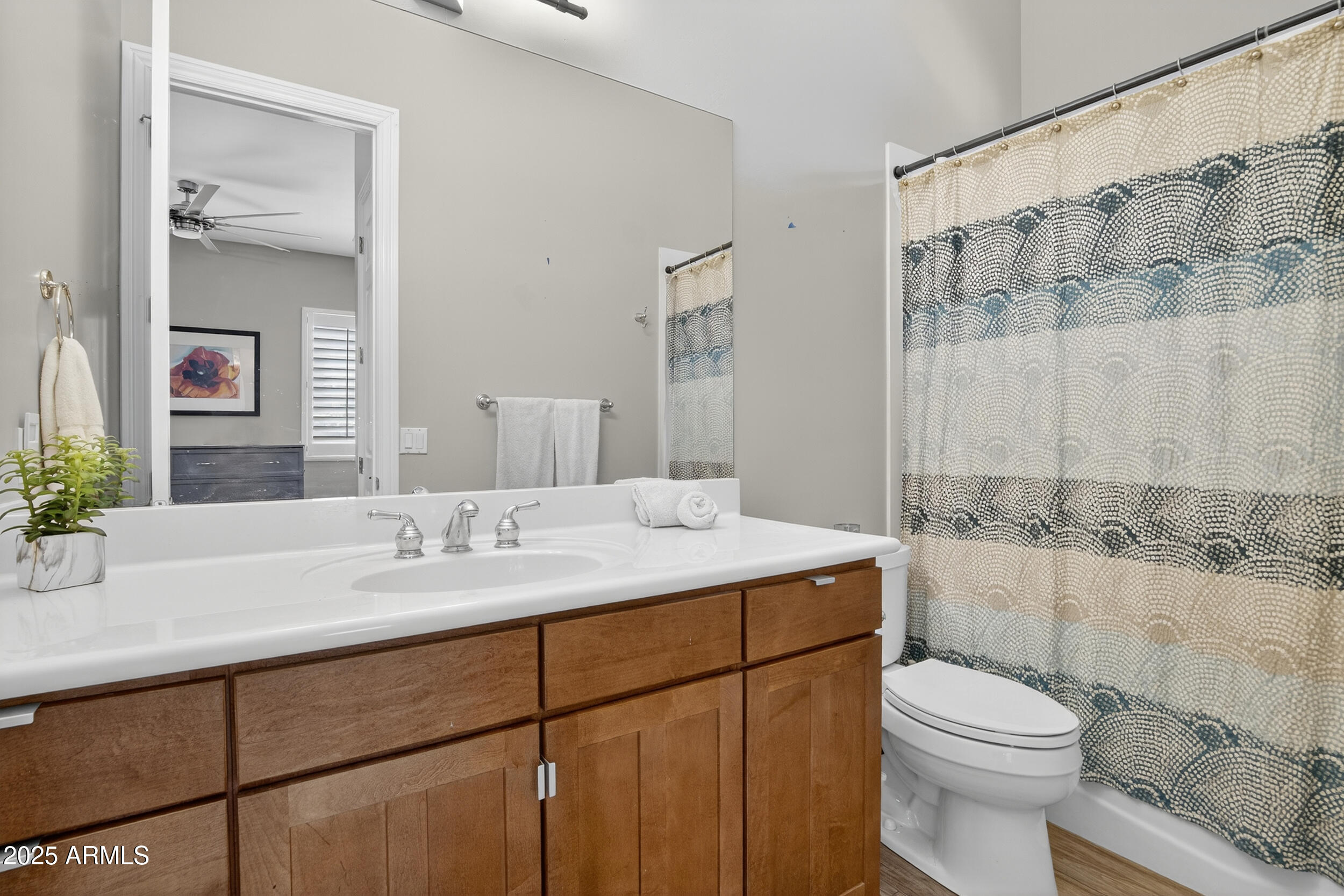 1333 North Cliffside Drive Gilbert, AZ 85234 - Photo 40 of 98 a bathroom with a sink a toilet and shower