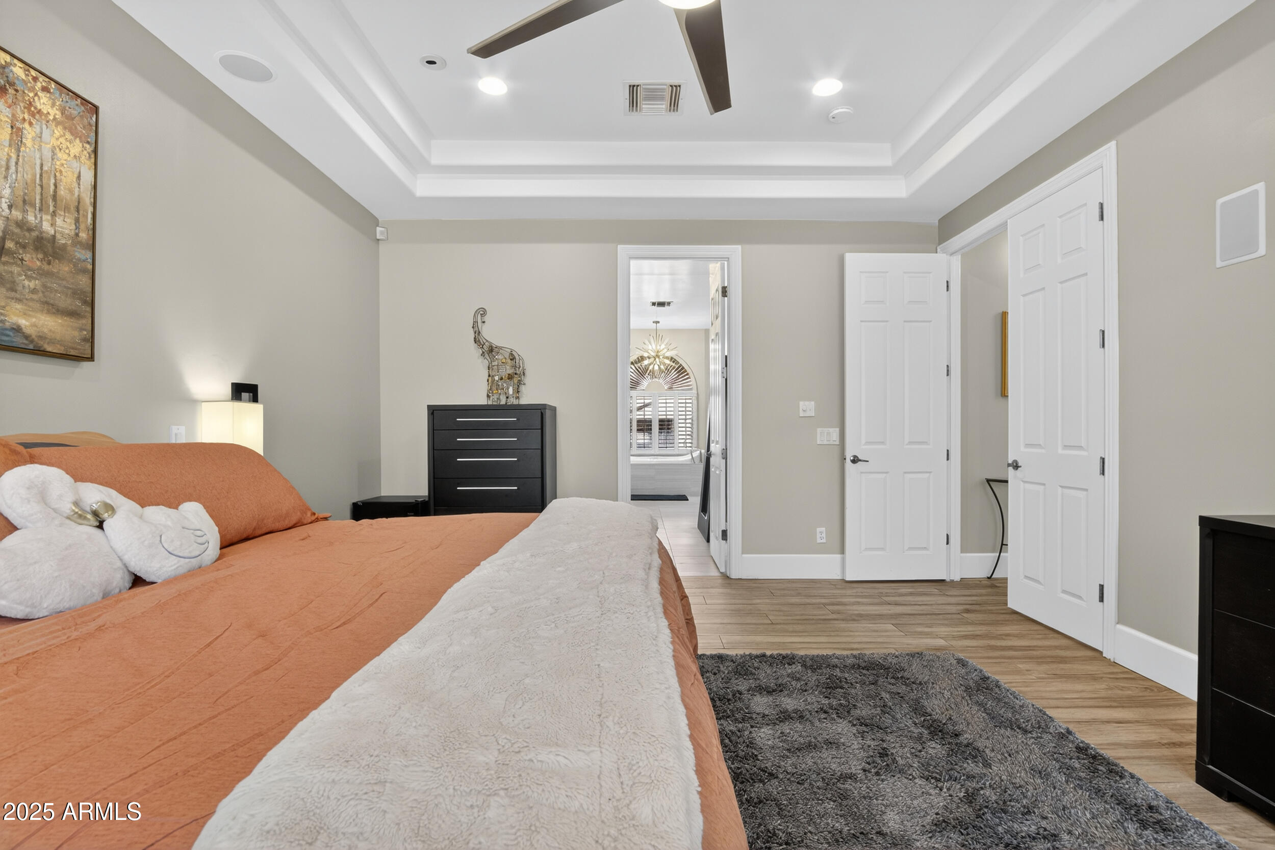 1333 North Cliffside Drive Gilbert, AZ 85234 - Photo 43 of 98 a bedroom with a bed and a walk in closet