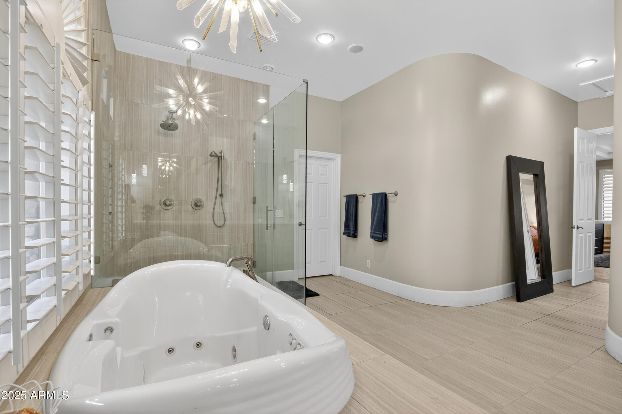 1333 North Cliffside Drive Gilbert, AZ 85234 - Photo 46 of 98 a bathroom with a bathtub and a shower