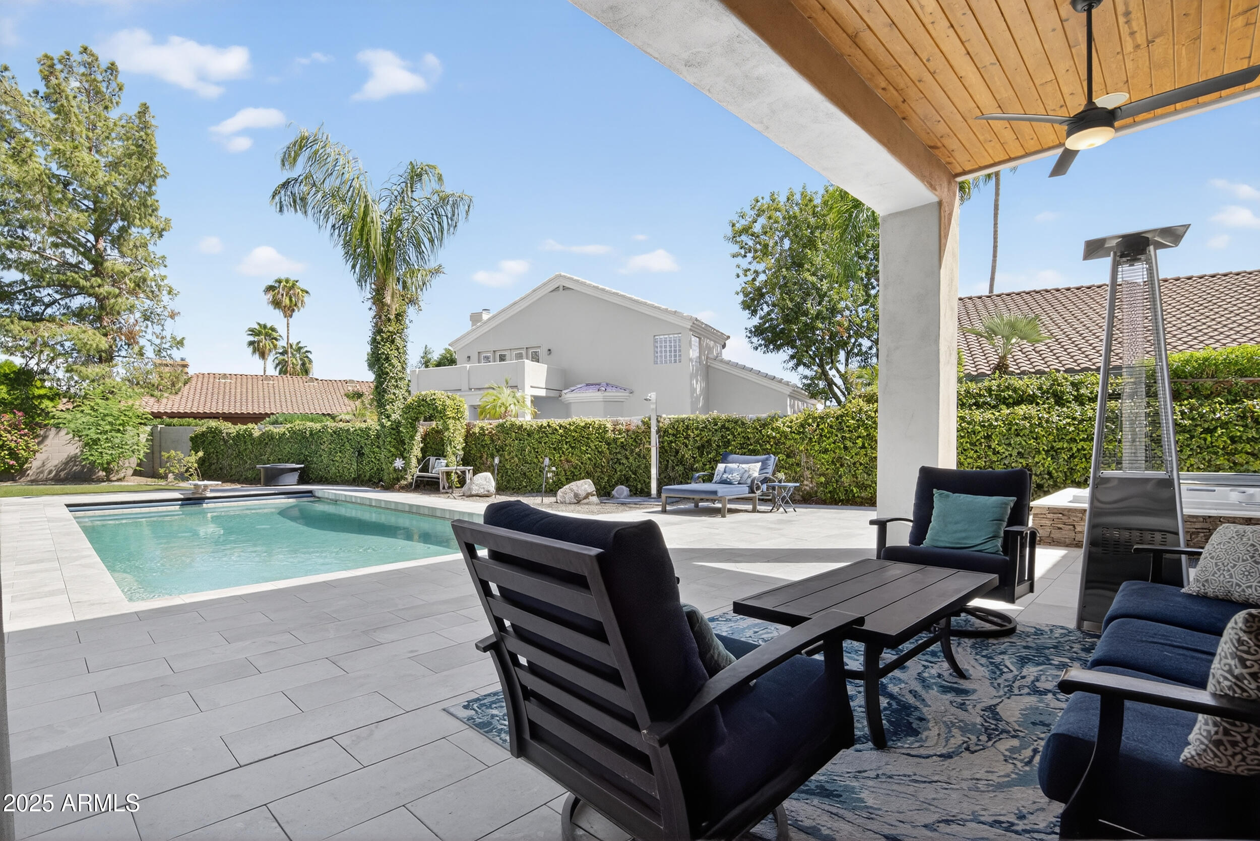 1333 North Cliffside Drive Gilbert, AZ 85234 - Photo 62 of 98 a view of a patio with a table and chairs