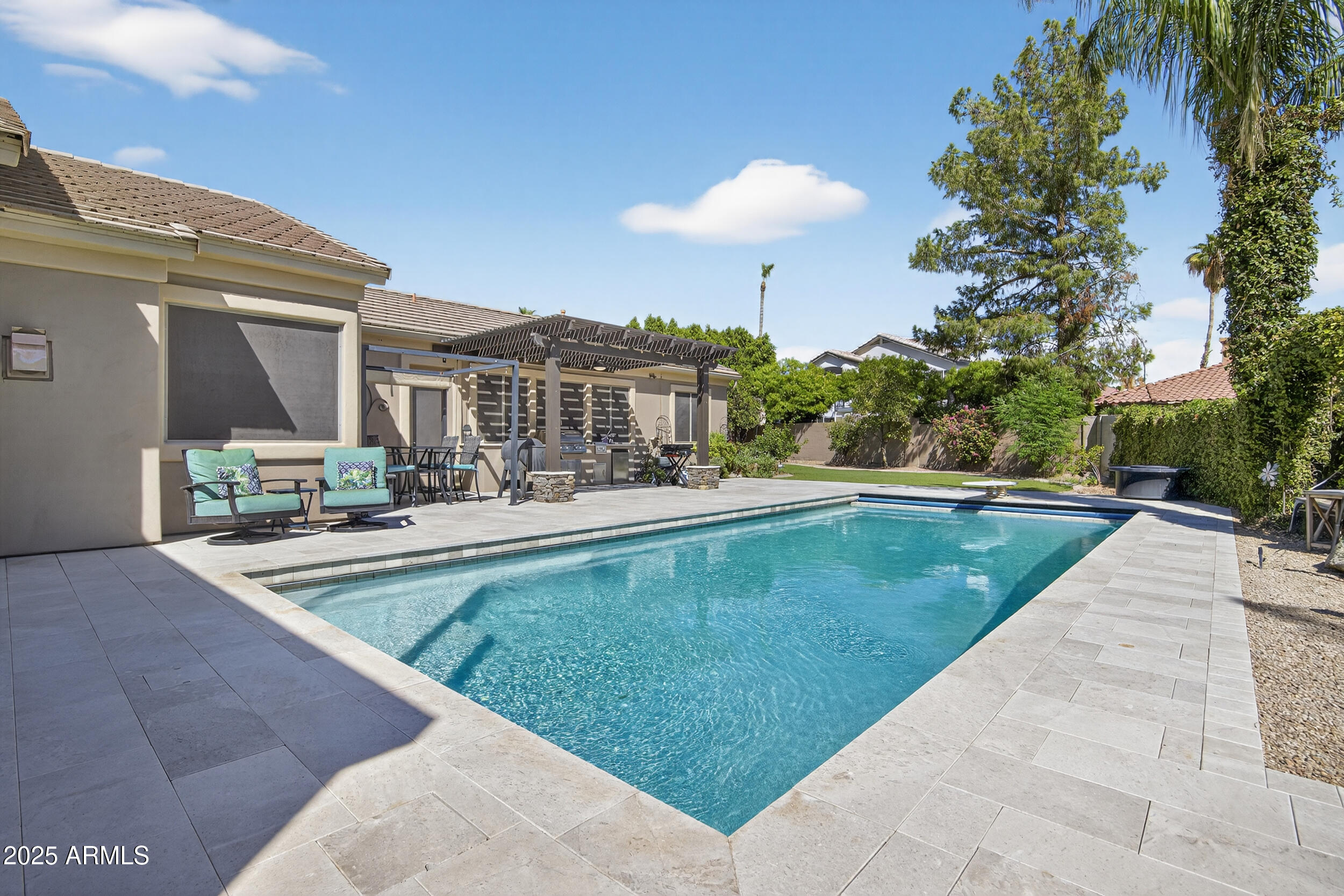 1333 North Cliffside Drive Gilbert, AZ 85234 - Photo 69 of 98 a view of a swimming pool with a patio
