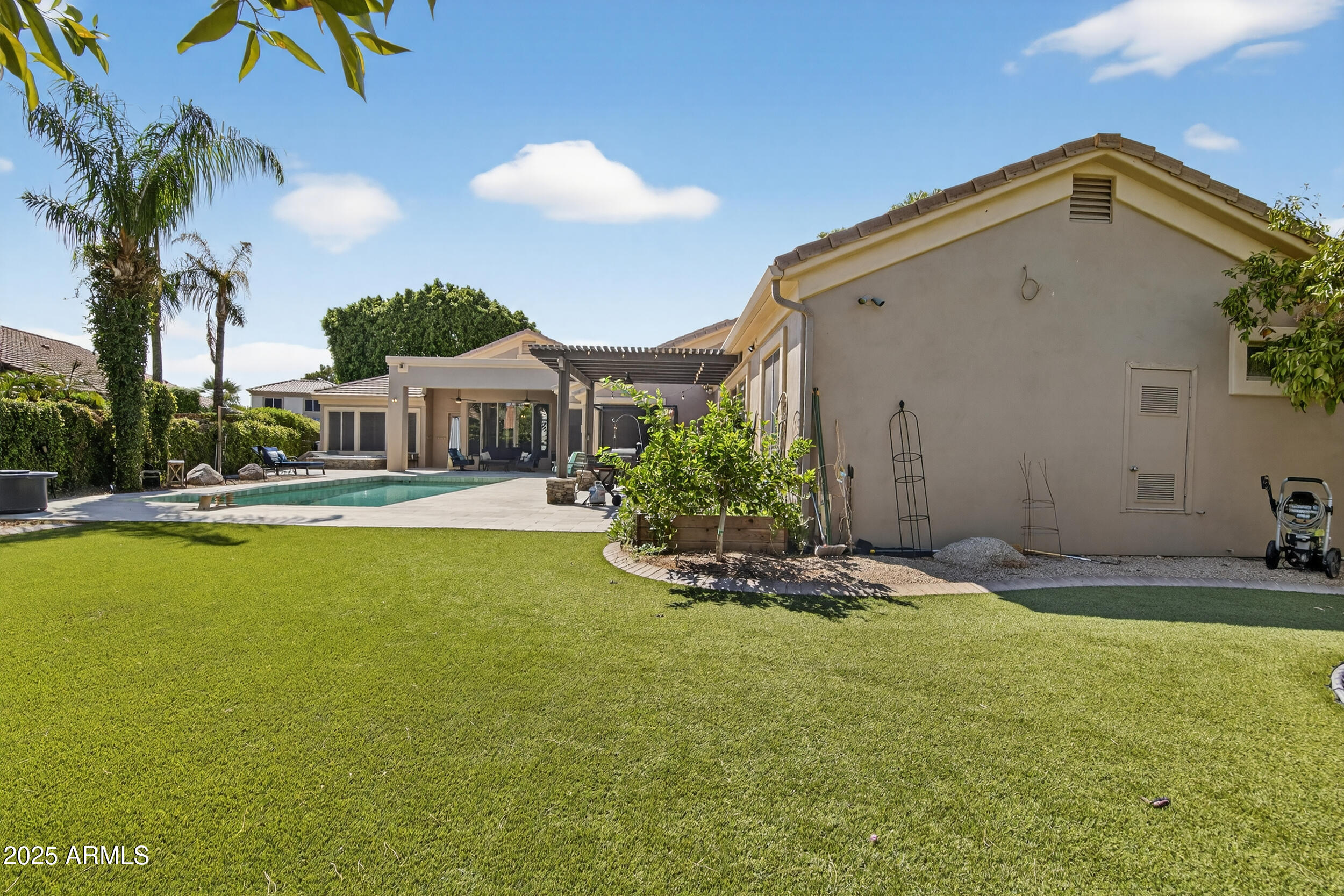 1333 North Cliffside Drive Gilbert, AZ 85234 - Photo 73 of 98 a house with swimming pool in front of it