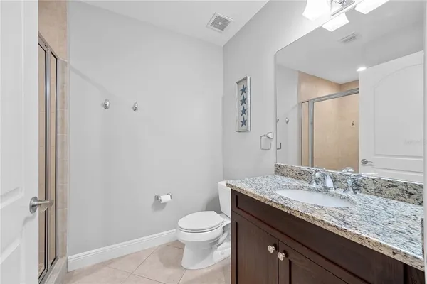 a swimming pool with outdoor seating