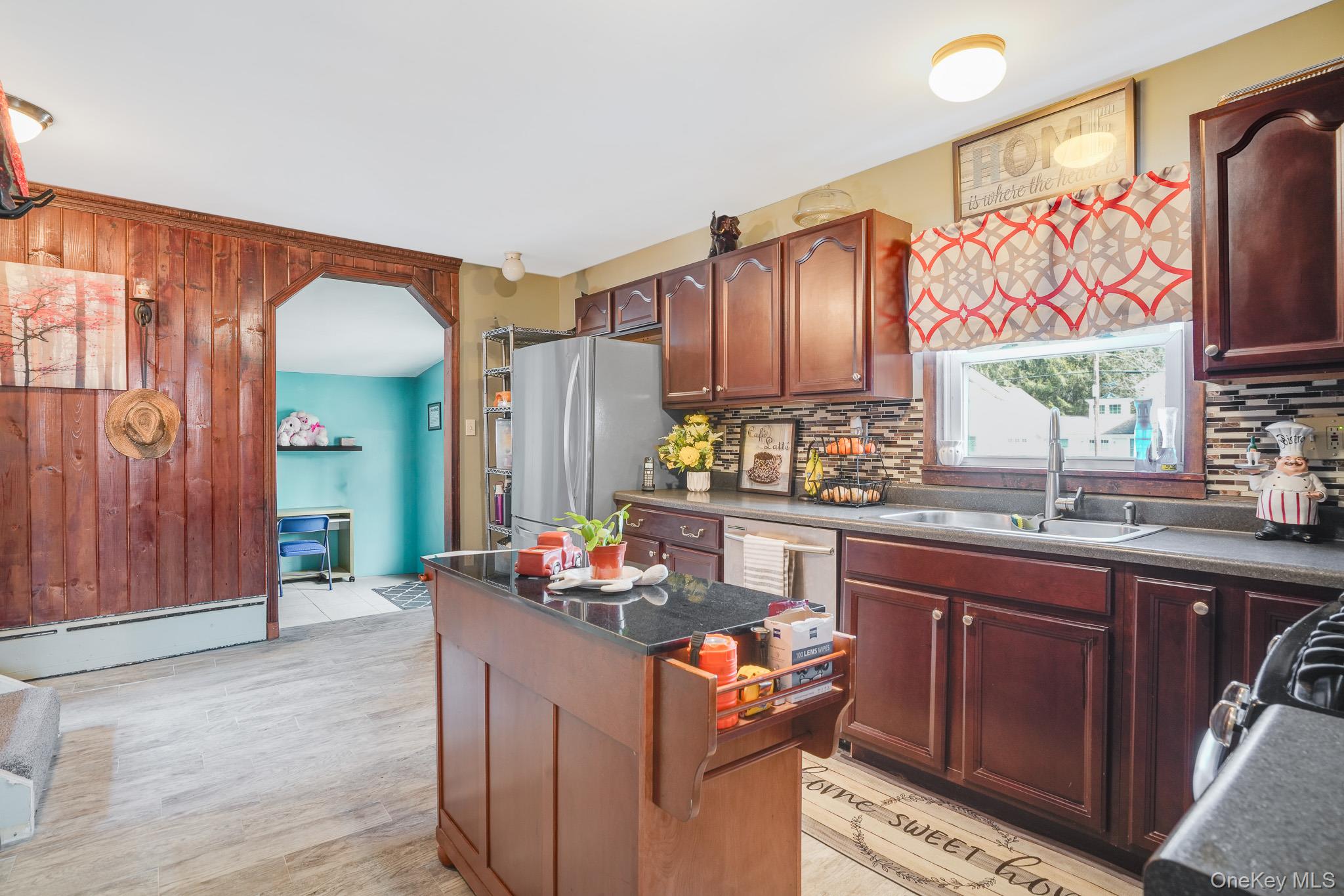 11 Gale Road Mongaup Valley, NY 12762 - Photo 13 of 39 a kitchen with granite countertop a sink stove and cabinets