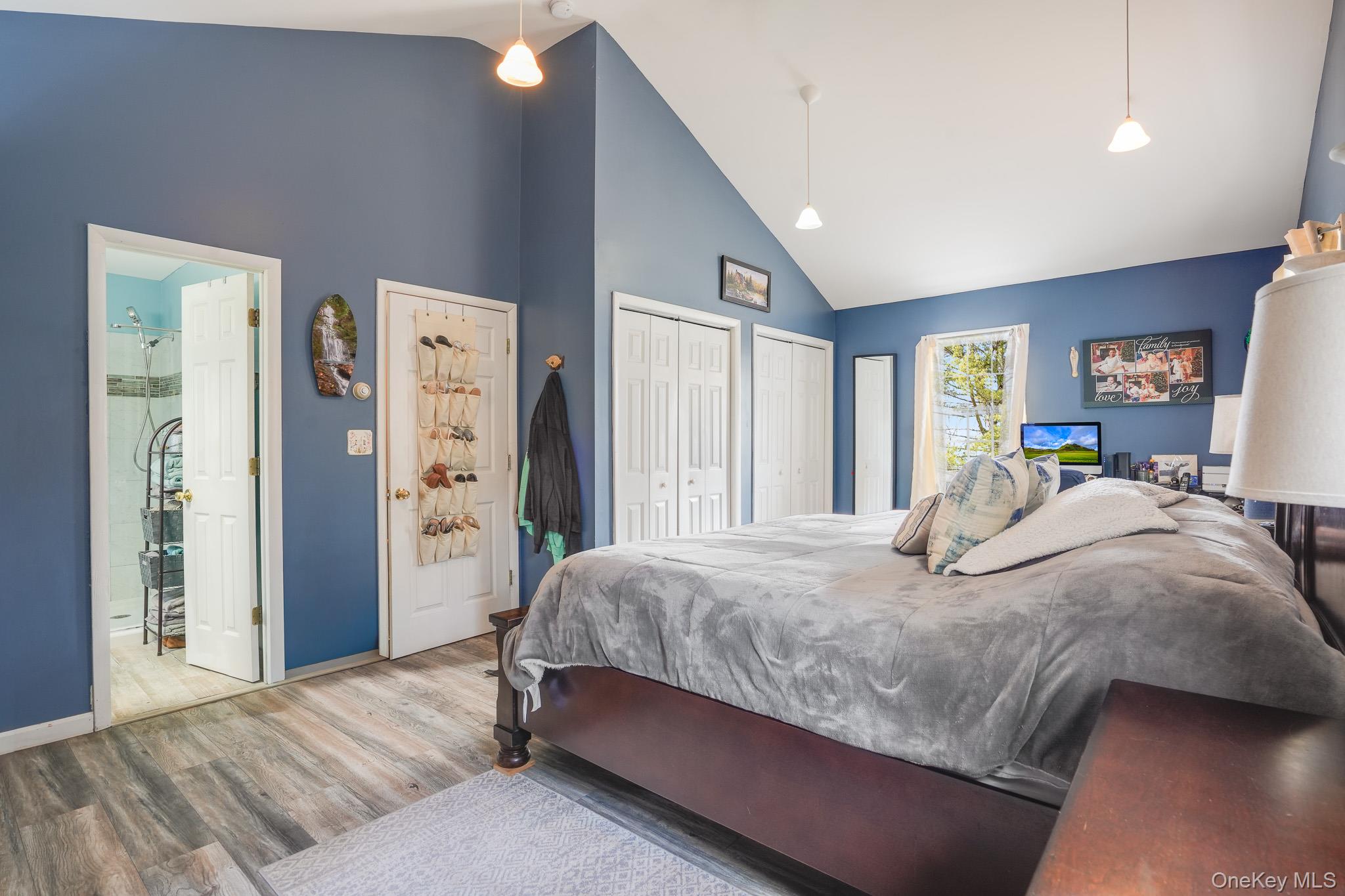 11 Gale Road Mongaup Valley, NY 12762 - Photo 20 of 39 a bedroom with a bed and large windows