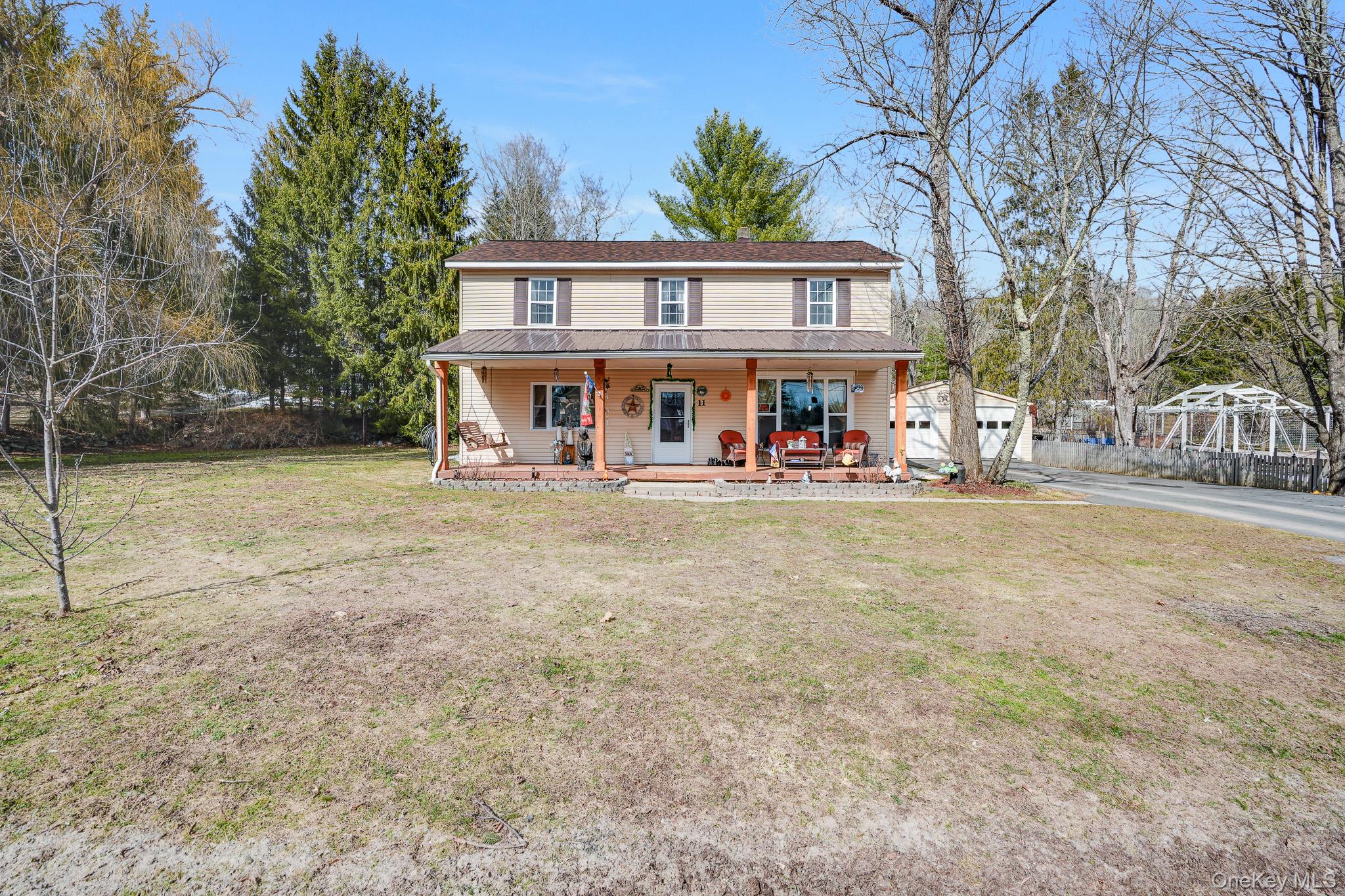 11 Gale Road Mongaup Valley, NY 12762 - Photo 2 of 39 a view of a house next to a yard with large trees