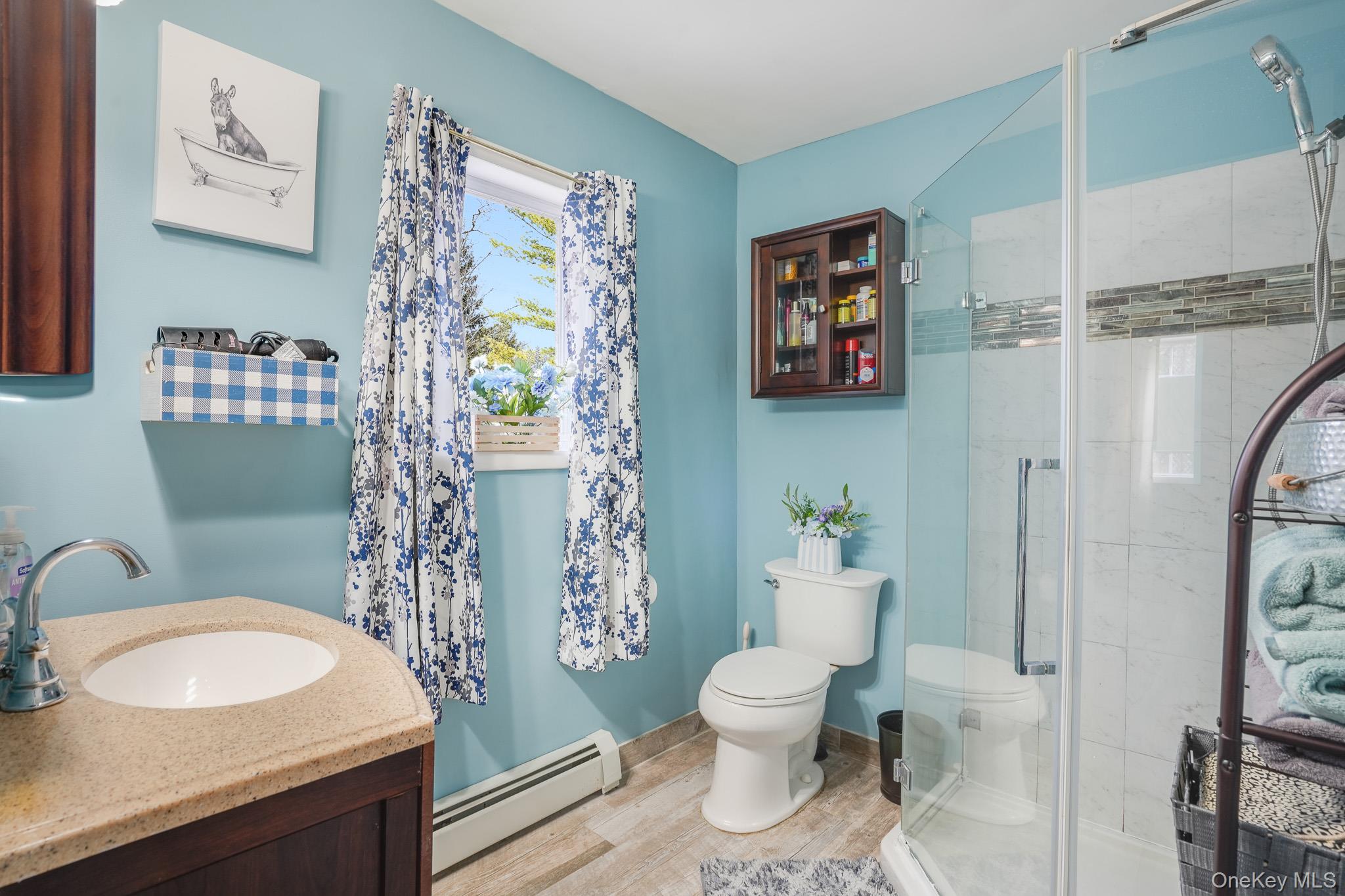 11 Gale Road Mongaup Valley, NY 12762 - Photo 23 of 39 a bathroom with a toilet sink and mirror