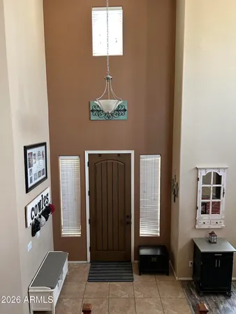 a bedroom with a bed and a table