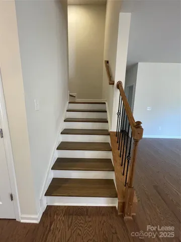 a bathroom with a double vanity sink and mirror