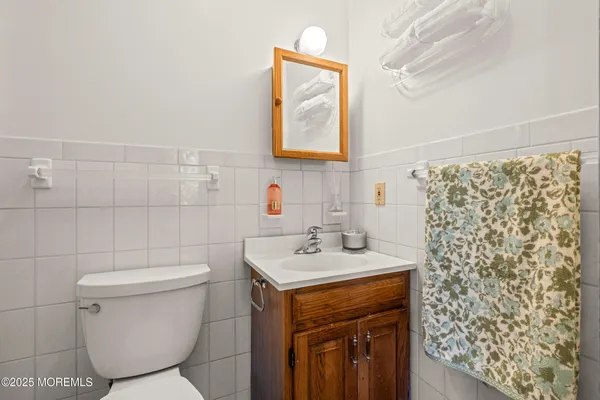 a bathroom with a shower and a toilet