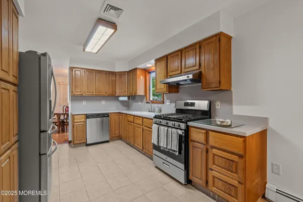 a view of a dining room with furniture window and outside view