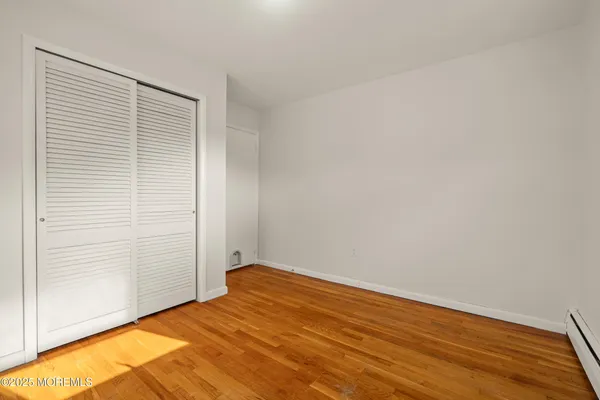 a view of deck with wooden floor and fence
