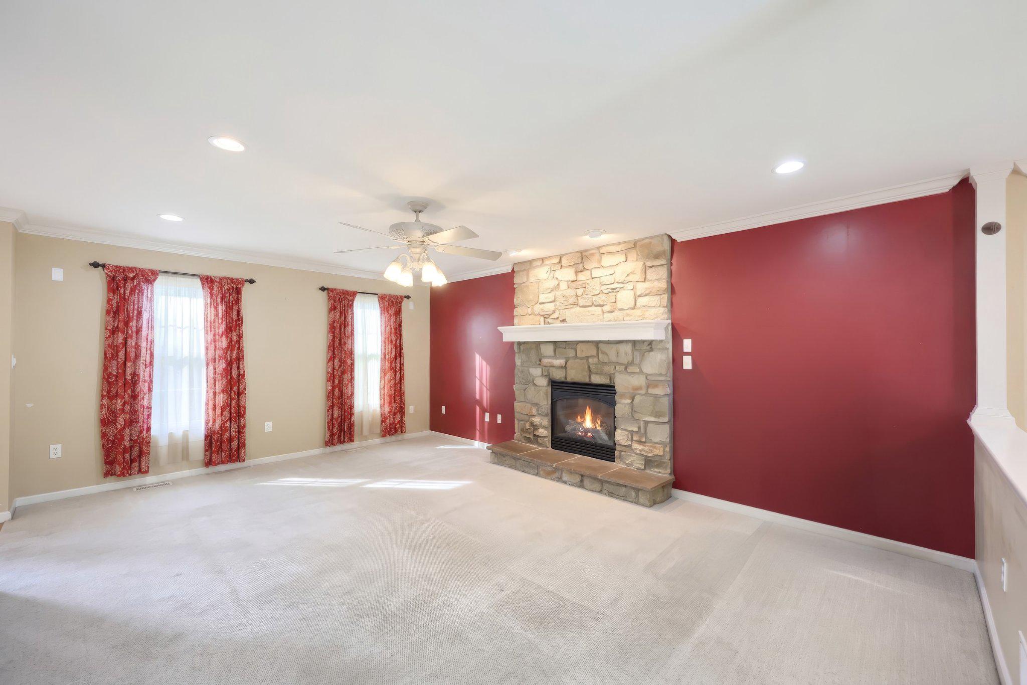 1540 Lilac Road York, PA 17408 - Photo 10 of 74 Cozy living room with a stone fireplace.