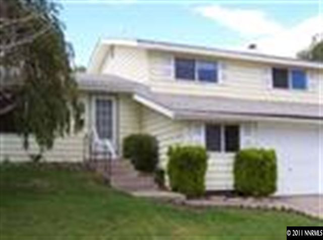 3685 Meeks Way Reno, NV 89503 - Photo 1 of 1 a view of a house with a yard and plants