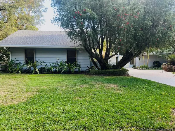 a view of a house with garden