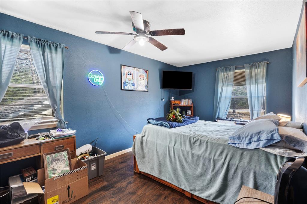101 Frazier Oaks Road Pottsboro, TX 75076 - Photo 23 of 36 a bed room with a bed and a window