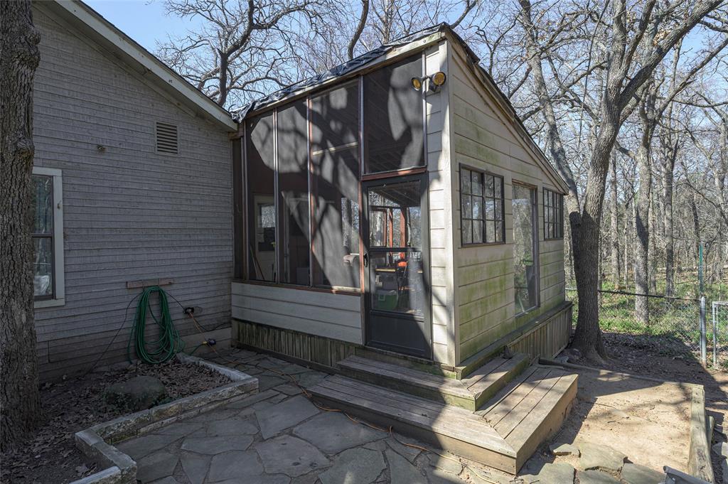 101 Frazier Oaks Road Pottsboro, TX 75076 - Photo 26 of 36 a view of a house with a yard