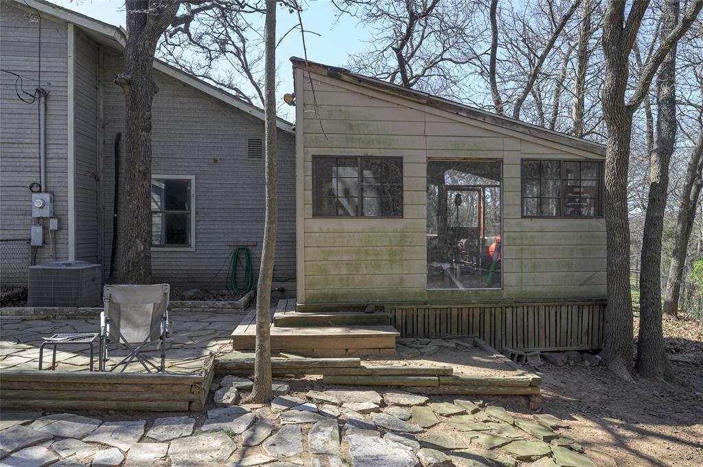 101 Frazier Oaks Road Pottsboro, TX 75076 - Photo 27 of 36 a view of house with backyard