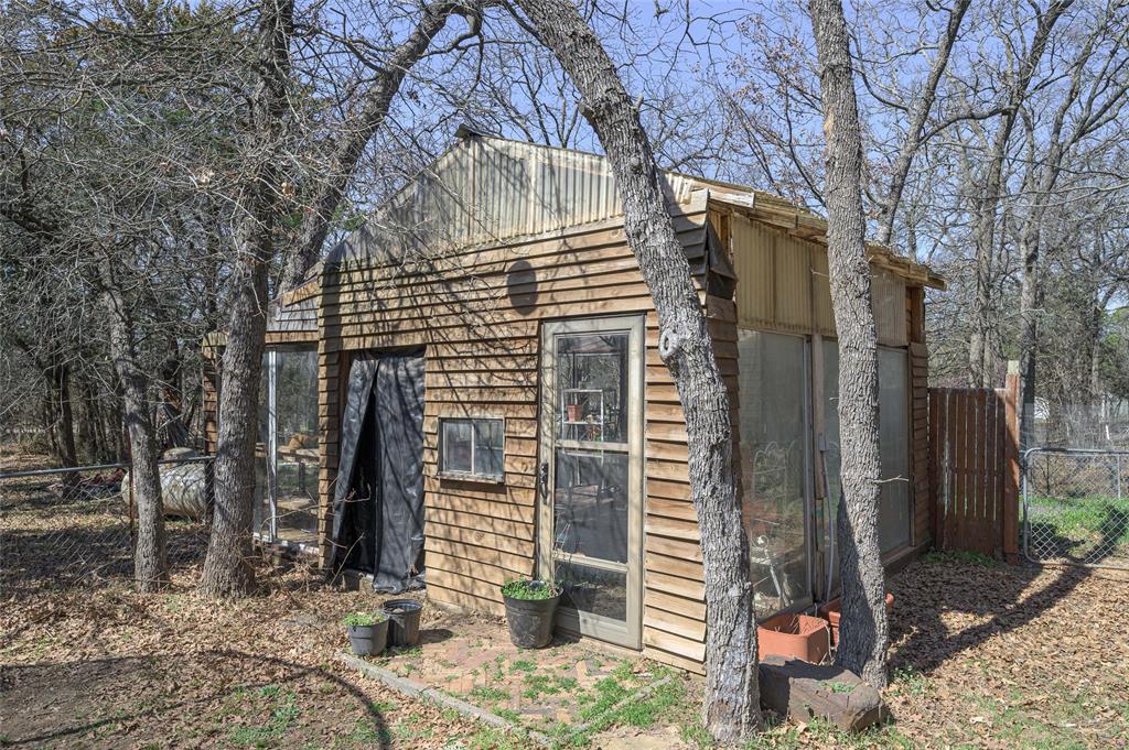 101 Frazier Oaks Road Pottsboro, TX 75076 - Photo 31 of 36 a front view of a house