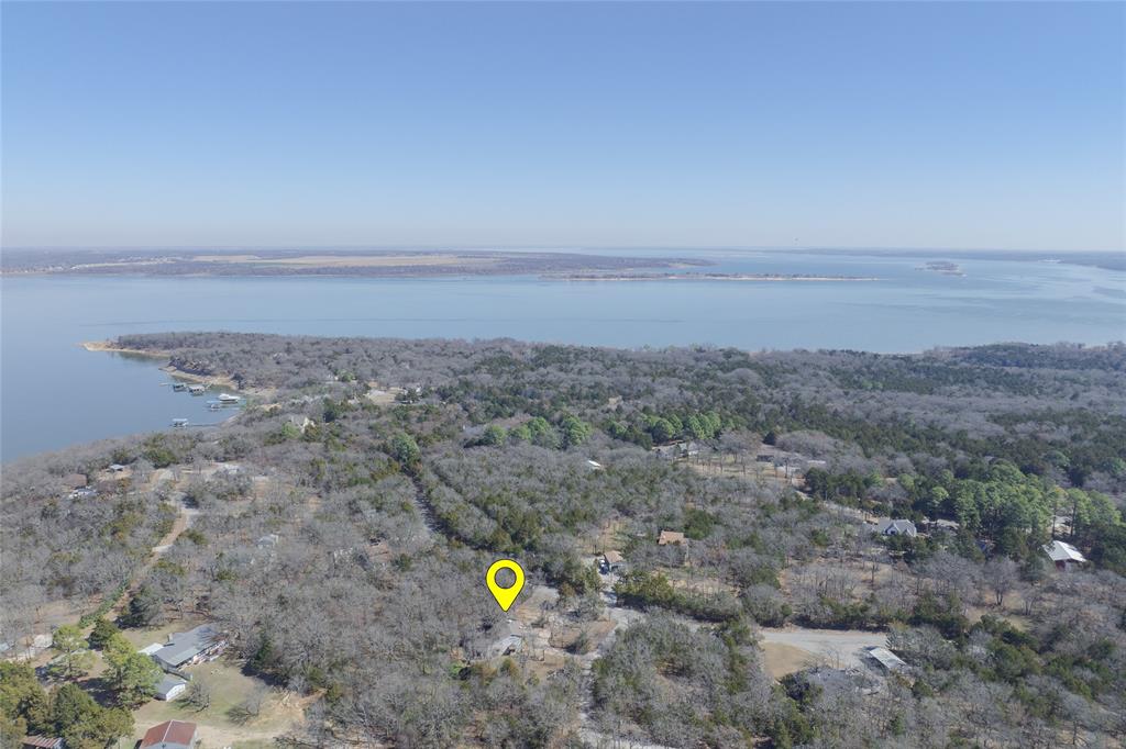 101 Frazier Oaks Road Pottsboro, TX 75076 - Photo 34 of 36 a view of a dry yard with an outdoor space