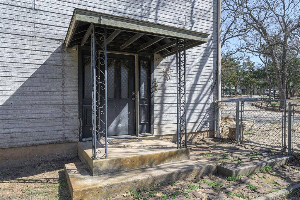 101 Frazier Oaks Road Pottsboro, TX 75076 - Photo 6 of 36 a view of a bird door of the house