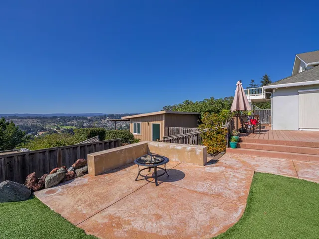 a view of a terrace with sitting area