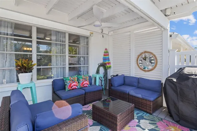 a bed room with a bed a table and chairs