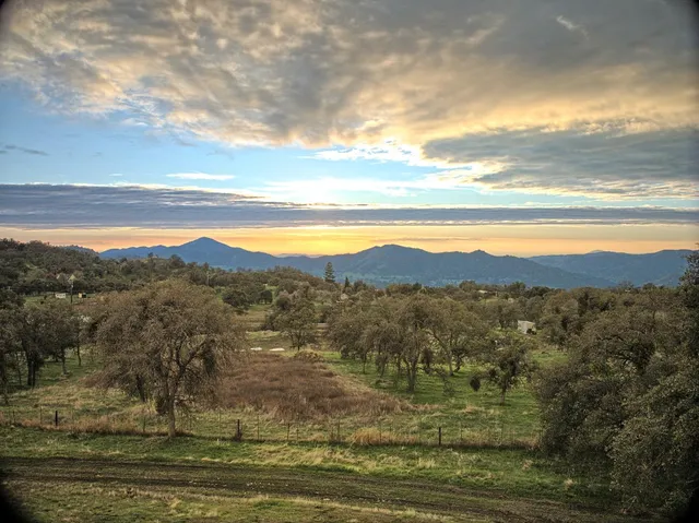 a view of lake with mountain