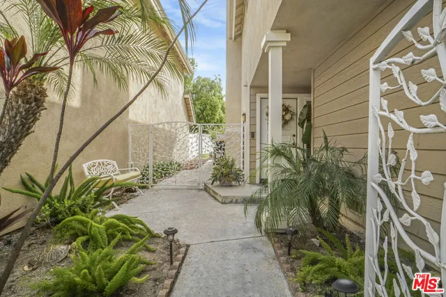 a view of a potted plants next to a building