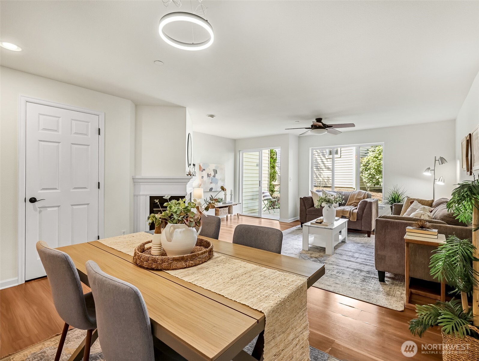 2300 Jefferson Avenue Northeast, Unit I137 Renton, WA 98056 - Photo 11 of 40 a view of a dining room with furniture and wooden floor