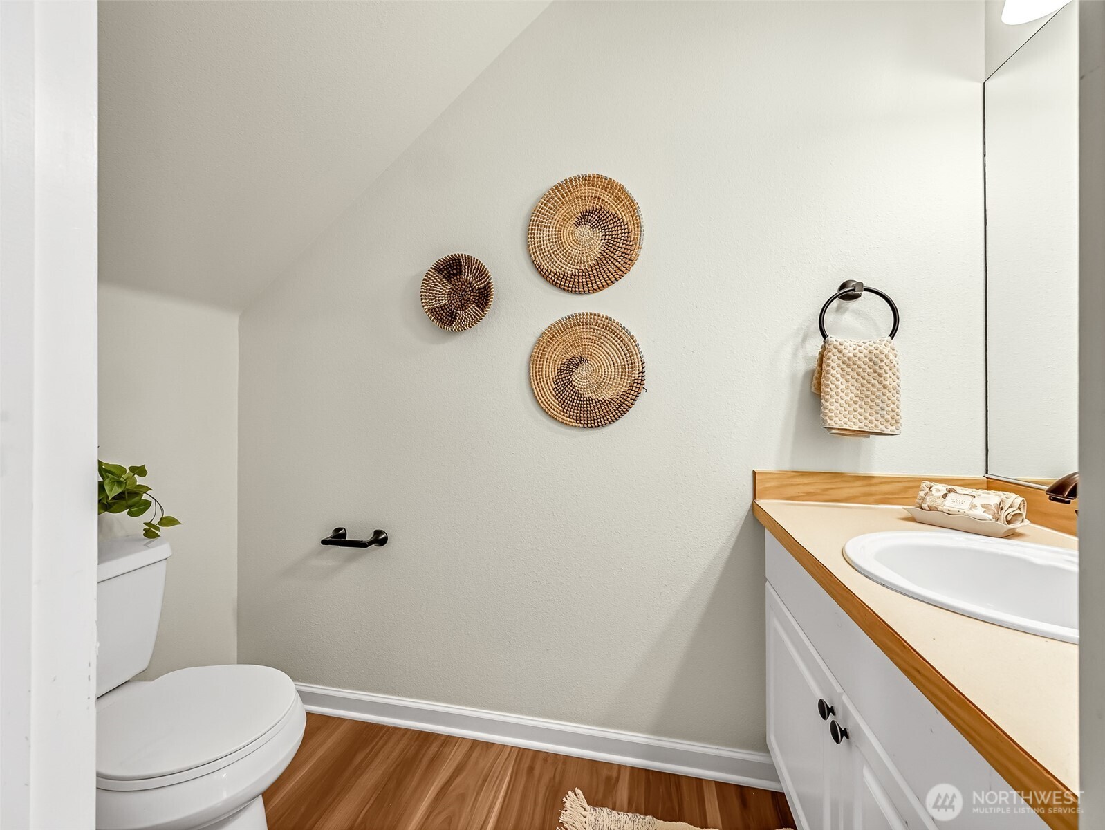 2300 Jefferson Avenue Northeast, Unit I137 Renton, WA 98056 - Photo 13 of 40 a bathroom with a granite countertop toilet sink and mirror