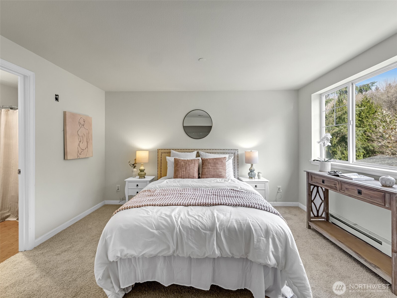 2300 Jefferson Avenue Northeast, Unit I137 Renton, WA 98056 - Photo 22 of 40 a bedroom with a bed and a large window