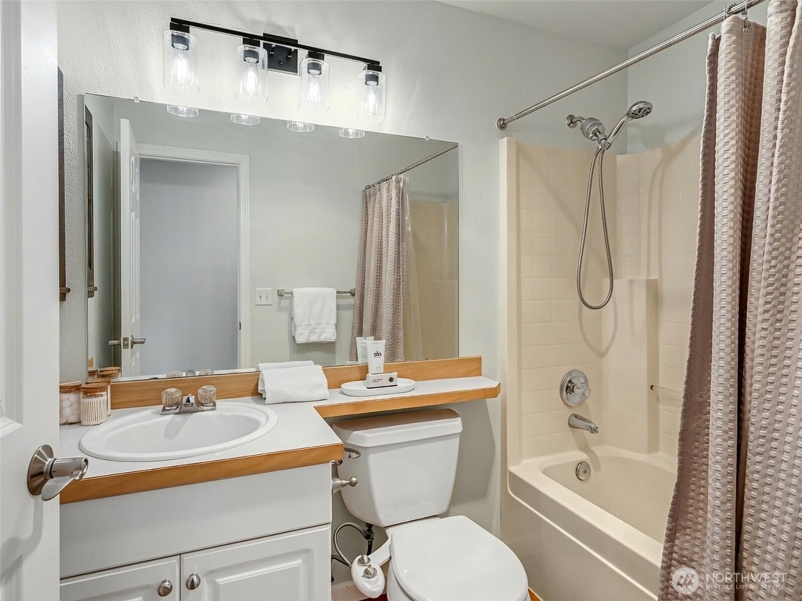 2300 Jefferson Avenue Northeast, Unit I137 Renton, WA 98056 - Photo 24 of 40 a bathroom with a sink toilet tub and shower