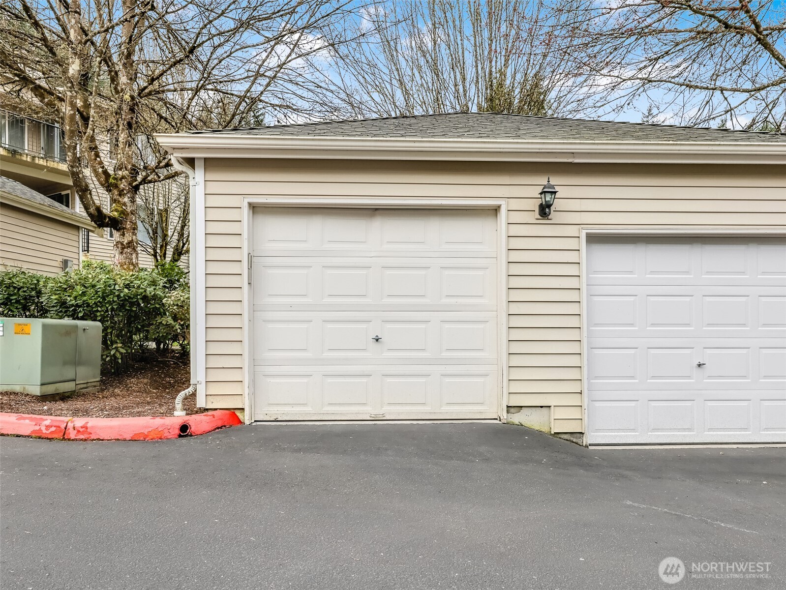 2300 Jefferson Avenue Northeast, Unit I137 Renton, WA 98056 - Photo 37 of 40 a view of a house with a garage