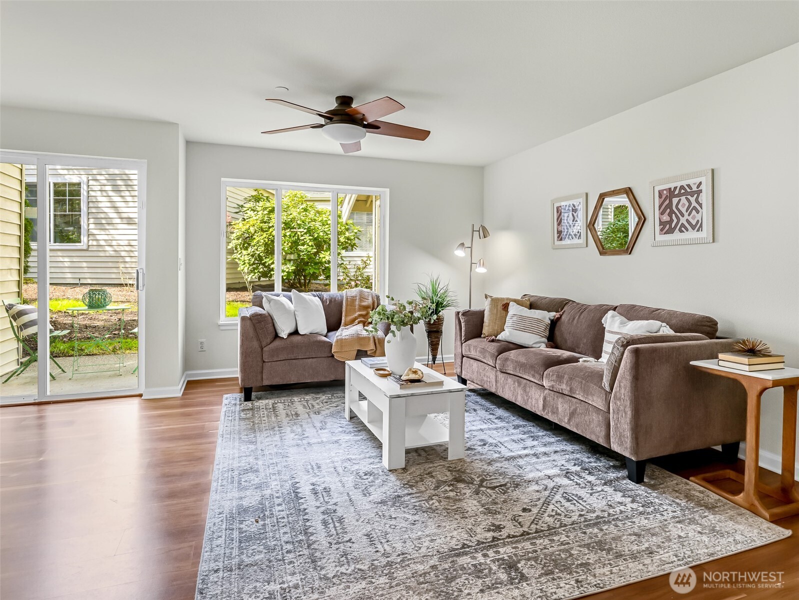 2300 Jefferson Avenue Northeast, Unit I137 Renton, WA 98056 - Photo 5 of 40 a living room with furniture and a large window