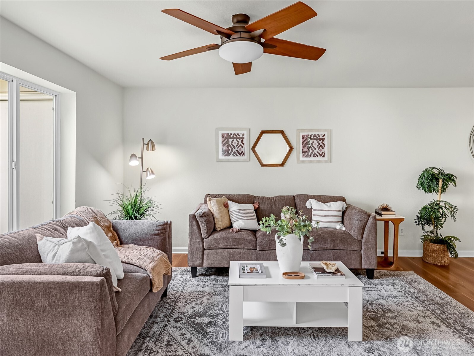 2300 Jefferson Avenue Northeast, Unit I137 Renton, WA 98056 - Photo 7 of 40 a living room with furniture and wooden floor