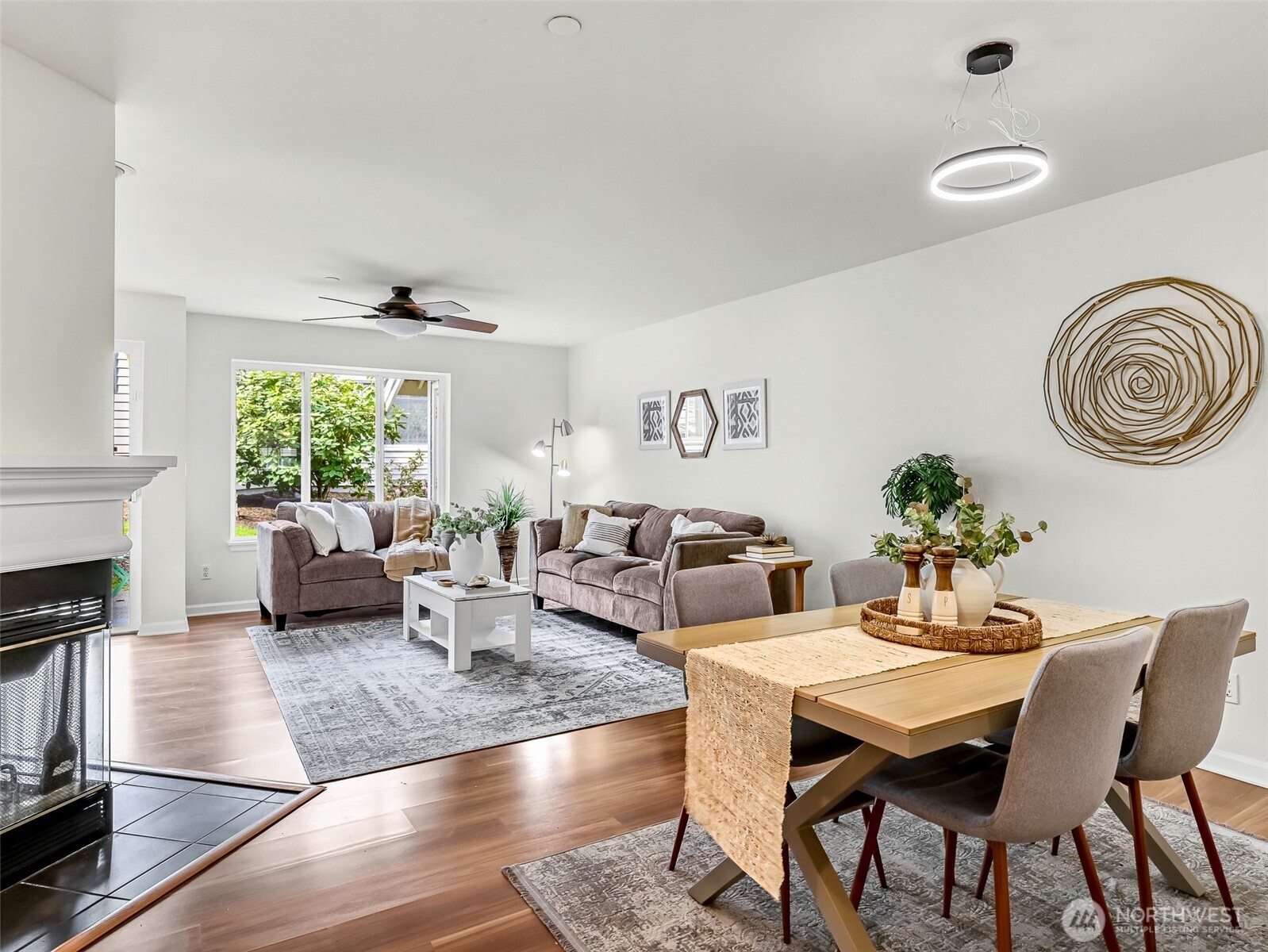 2300 Jefferson Avenue Northeast, Unit I137 Renton, WA 98056 - Photo 10 of 40 a view of a dining room with furniture window and wooden floor