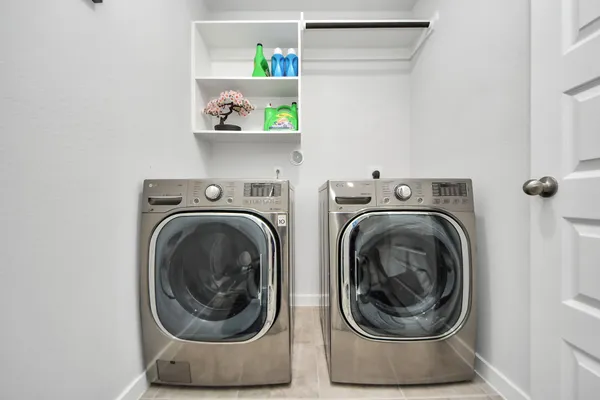 a utility room with dryer and washer