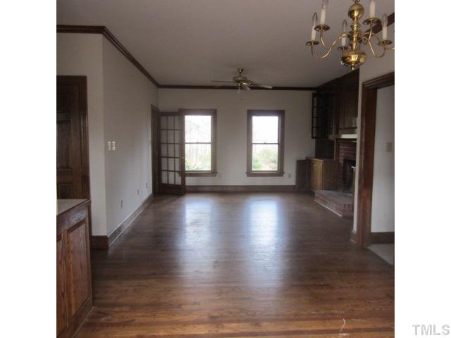 39 Dawn Road Benson, NC 27504 - Photo 3 of 11 a view of a room with wooden floor and windows