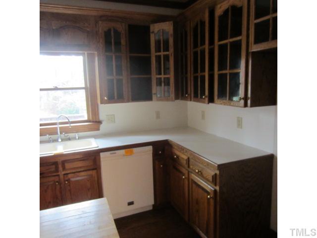 39 Dawn Road Benson, NC 27504 - Photo 6 of 11 a kitchen with a sink and a window