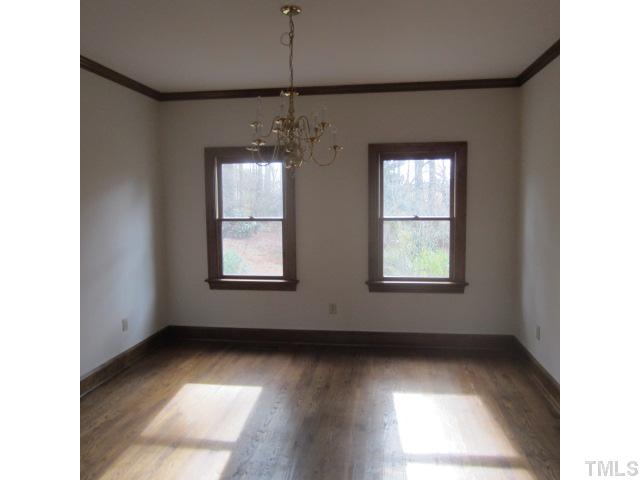 39 Dawn Road Benson, NC 27504 - Photo 7 of 11 a view of an empty room with a window