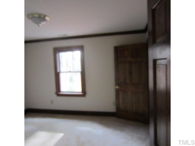 39 Dawn Road Benson, NC 27504 - Photo 10 of 11 a view of a room that has a window in it